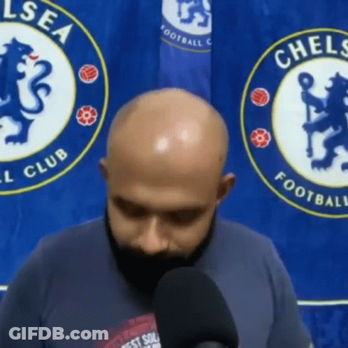 Man With Beard Talking Into Microphone GIF