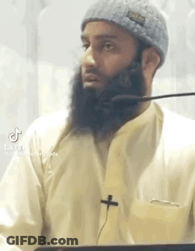 Man With Beard Talking Into Microphone GIF