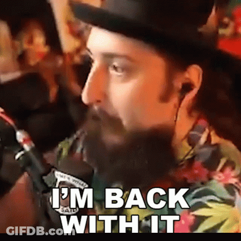 Man With Beard Talking Into Microphone GIF