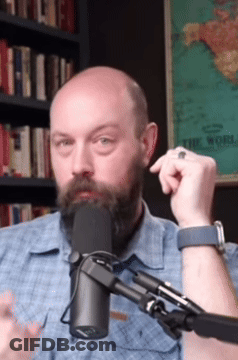 Man With Beard Talking Into Microphone GIF