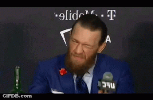 Man With Beard Talking Into Microphone GIF