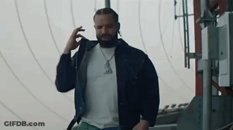 Man With Beard Talking On Cell Phone GIF