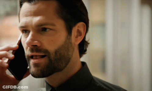 Man With Beard Talking On Cellphone GIF