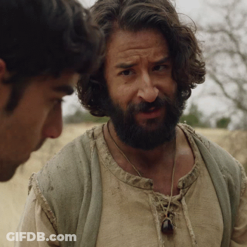 Man With Beard Talking To Another Man In Desert GIF