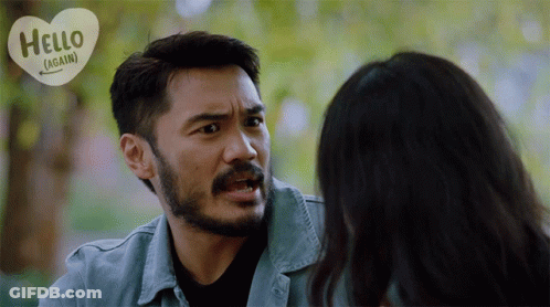 Man With Beard Talking To Woman GIF