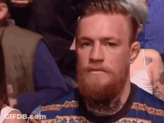 Man With Beard Watching Crowd GIF
