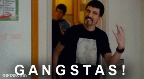Man With Beard Waving In Doorway GIF