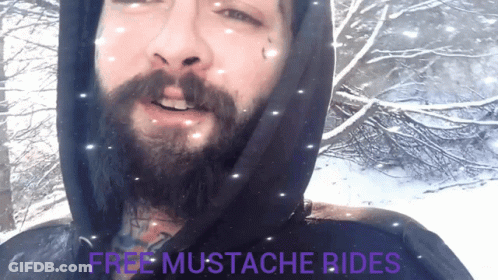 Man With Beard Wearing Black Hoodie Saying Free Mustache Rides GIF