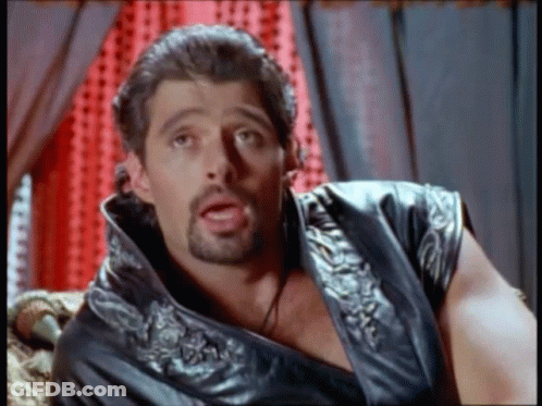 Man With Beard Wearing Black Vest GIF