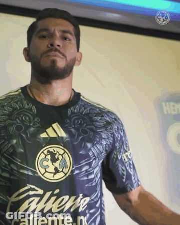 Man With Beard Wearing Caliente Shirt GIF