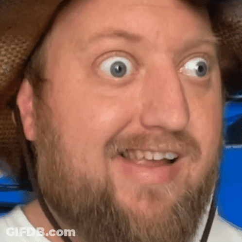 Man With Beard Wearing Cowboy Hat Making Funny Face GIF