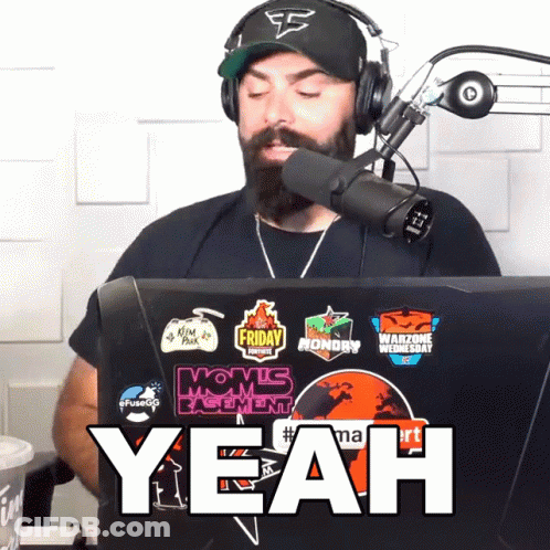 Man With Beard Wearing EA Hat And Headphones GIF