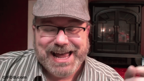 Man With Beard Wearing Glasses And Hat GIF