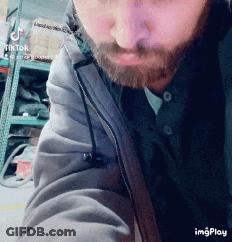 Man With Beard Wearing Grey Jacket GIF