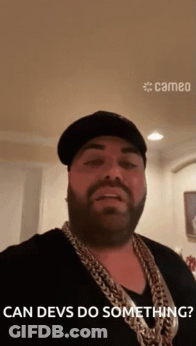 Man With Beard Wearing Hat And Chains Says Can Devs Do Something GIF