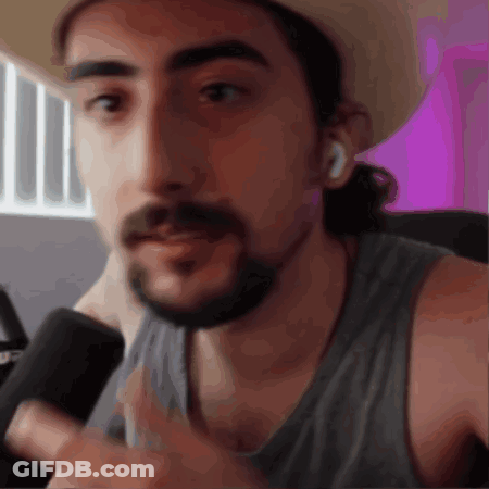 Man With Beard Wearing Hat And Grey Tank Top GIF