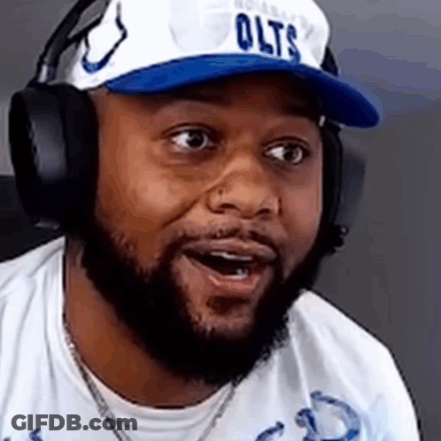 Man With Beard Wearing Hat And Headphones Making Funny Face GIF