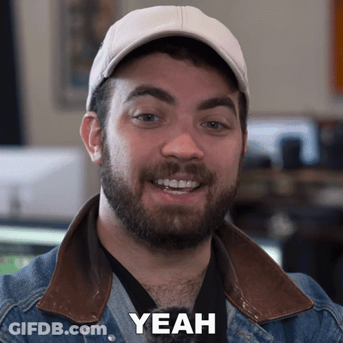 Man With Beard Wearing Hat And Jacket Says Yeah GIF