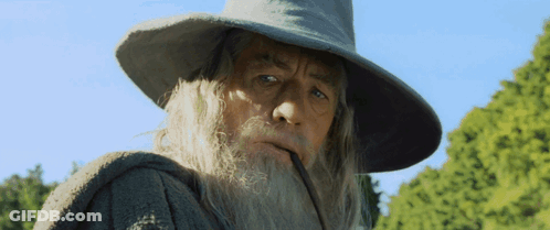 Man With Beard Wearing Hat Smoking Pipe GIF