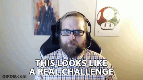 Man With Beard Wearing Headphones And Glasses Saying This Looks Like A Real Challenge GIF