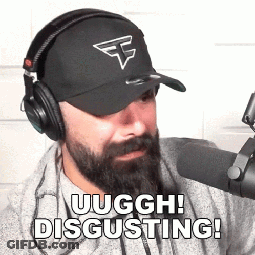Man With Beard Wearing Headphones And Hat Says Disgusting GIF