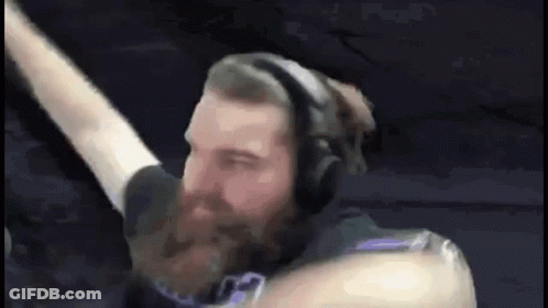 Man With Beard Wearing Headphones Holding Microphone GIF