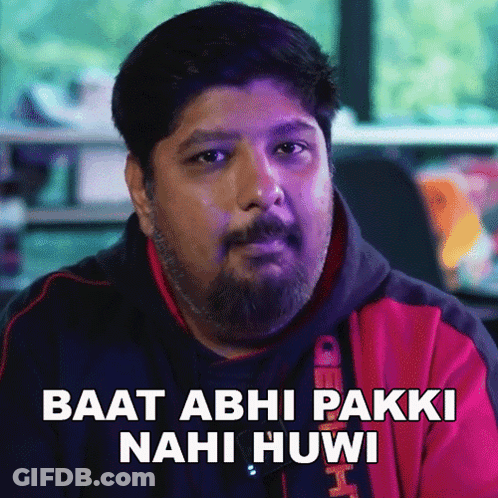Man With Beard Wearing Red Jacket Baat Abhi Pakki Nahi Huvi GIF