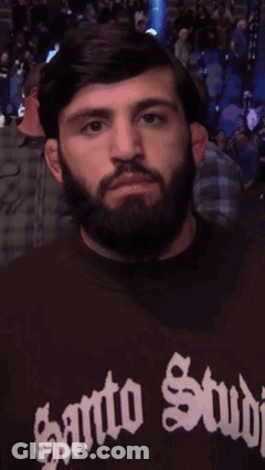 Man With Beard Wearing Santo Stud Shirt GIF