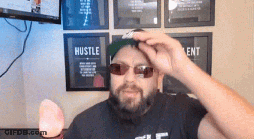 Man With Beard Wearing Sunglasses And Hat Saying Hustle GIF