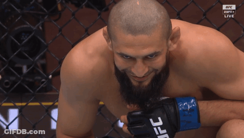 Man With Beard Wearing UFC Glove GIF