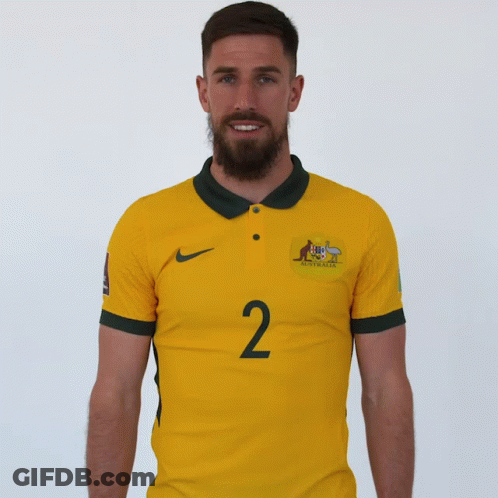Man With Beard Wearing Yellow Shirt Saying Australia GIF