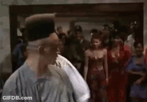Man With Big Afro Dancing In Crowd GIF