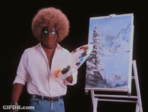 Man With Big Afro Holding Palette GIF