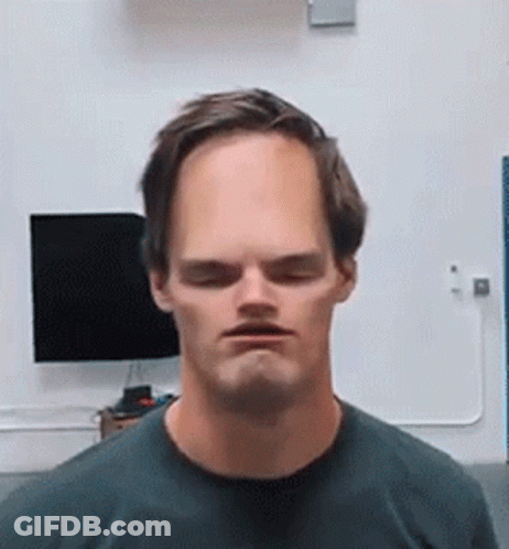 Man With Big Head Making Funny Face GIF