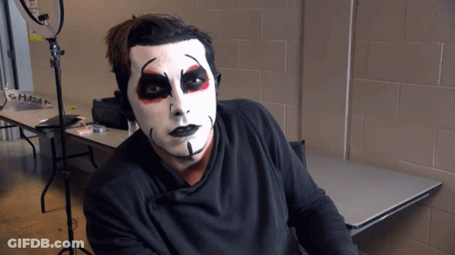 Man With Black And White Face Paint GIF