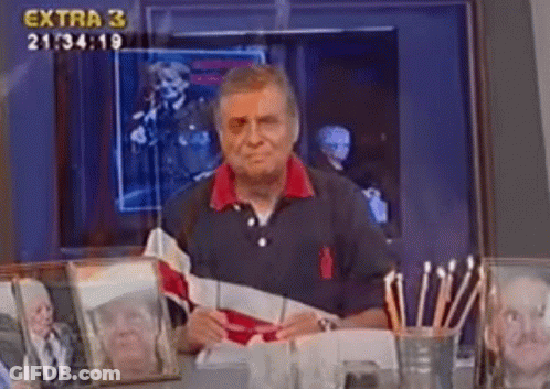 Man With Black Eye Sitting At Desk Extra 3 GIF