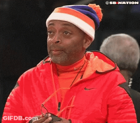 Man With 'Black' Hat And Microphone GIF