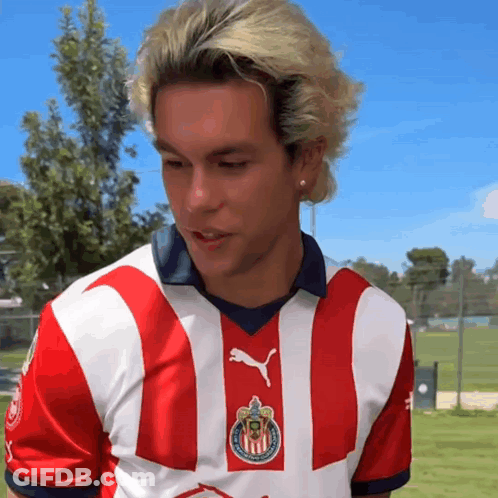 Man With Blonde Hair In Red And White Striped Shirt GIF