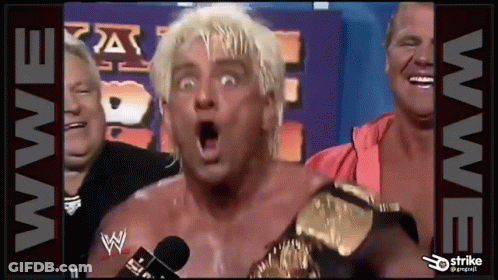 Man With Blonde Hair Talking Into Microphone GIF