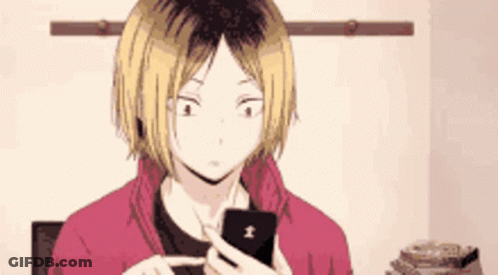 Man With Blonde Hair Using Cell Phone GIF