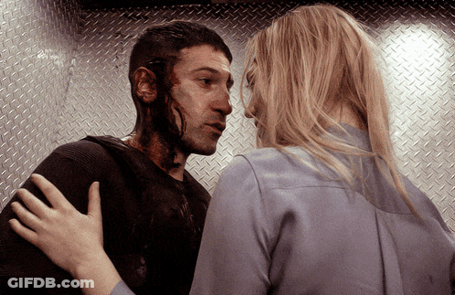 Man With Blood On Face Hugged By Blonde Woman GIF