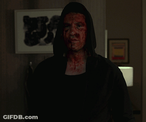 Man With Blood On Face In Black Hoodie GIF