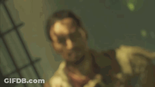 Man With Blood On Face In Dark Room GIF