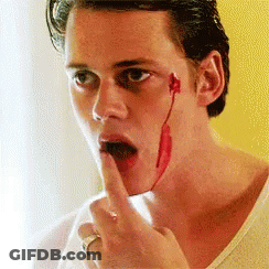 Man With Blood On Face Shushing GIF