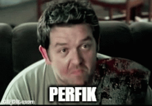 Man With Bloody Arm And Perfik On Couch GIF