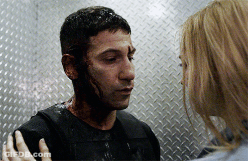Man With Bloody Face Comforted By Woman GIF