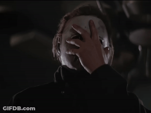 Man With Bloody Face Holding Knife GIF