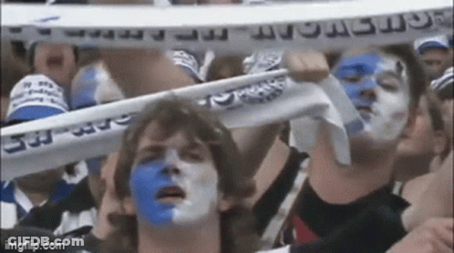 Man With Blue And White Paint Holding Amsterdam Scarf GIF