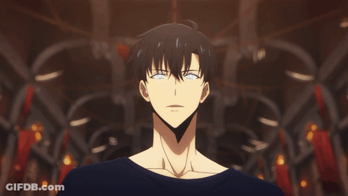 Man With Blue Eyes In Dark Room GIF
