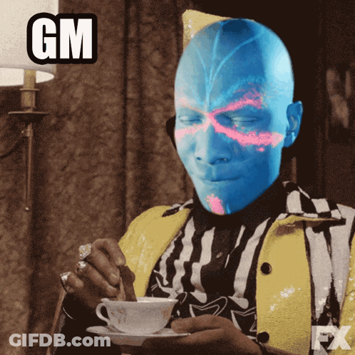 Man With Blue Face Drinking From Cup GIF